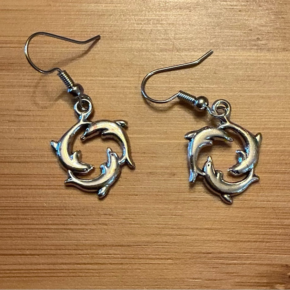Beautiful pair of Dolphin Earrings, Brand New!